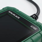 This image provides a close-up view of the Sparkace G700 scanner, highlighting the "SPARKACE" and "G700" branding on its screen bezel. It also shows the reinforced cable connection and the rugged, textured orange housing designed for durability.