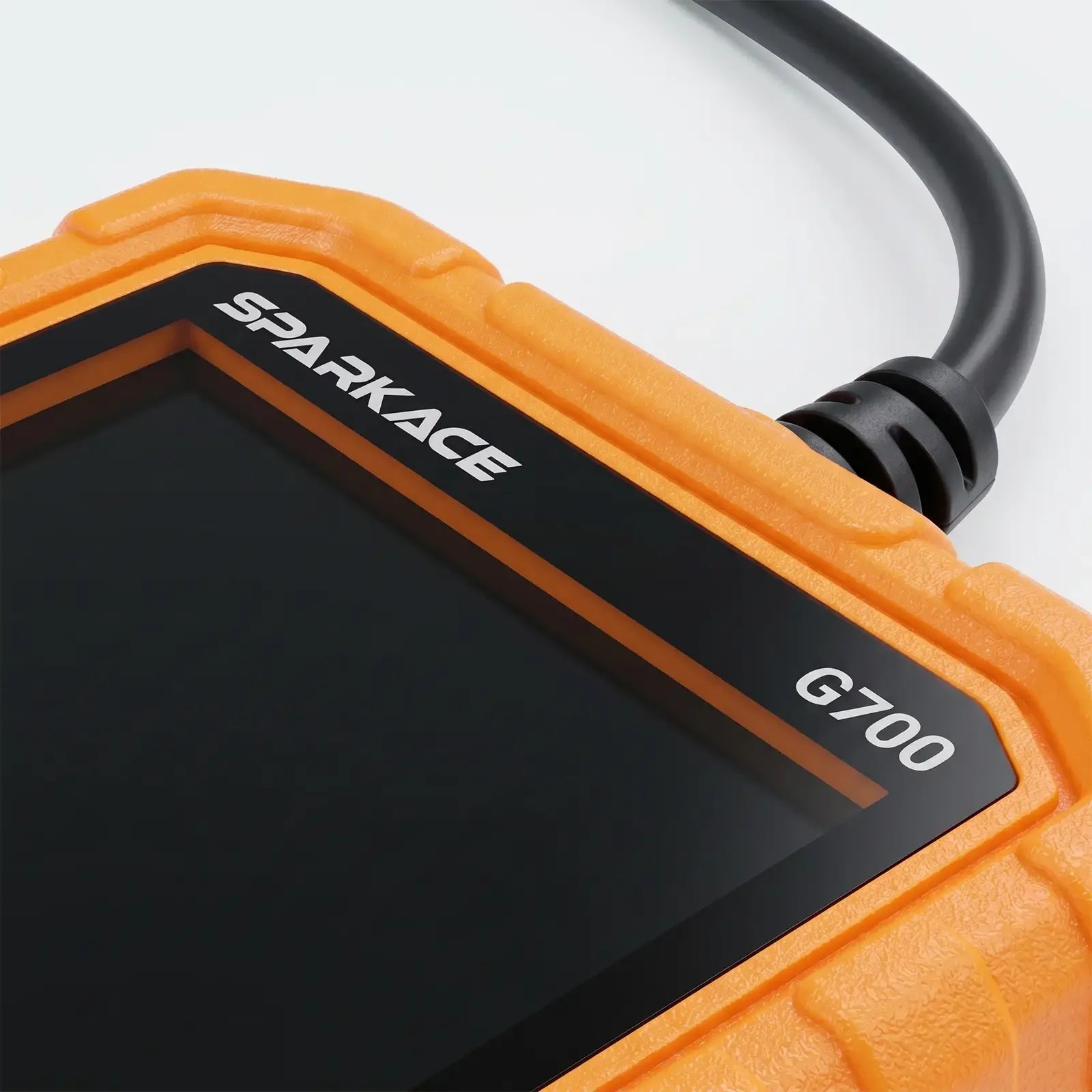 This image provides a close-up view of the Sparkace G700 scanner, highlighting the "SPARKACE" and "G700" branding on its screen bezel. It also shows the reinforced cable connection and the rugged, textured orange housing designed for durability.